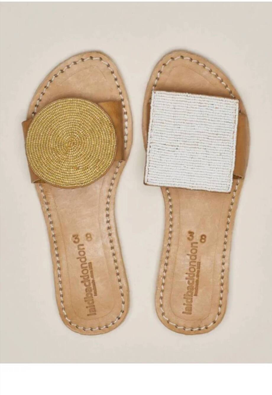 NEW LAIDBACK LONDON women's crey flip flops in gold/white